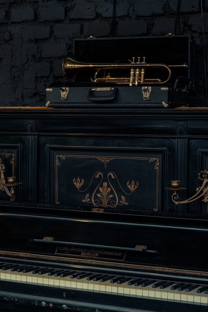 An elegant grand piano with a brass trumpet, epitomizing classical music charm in Chillán, Chile.